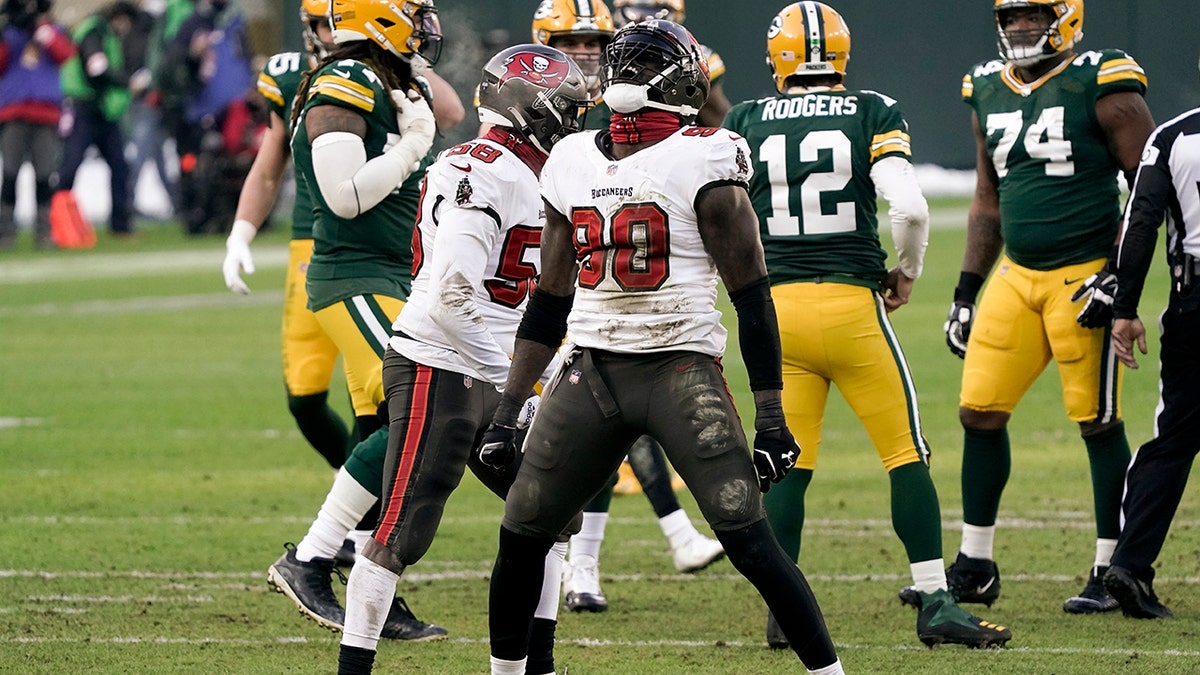 Tampa Bay Buccaneers' Jason Pierre-Paul reacts after sacking Green Bay Packers quarterback Aaron Rodgers during the first half of the NFC championship NFL football game in Green Bay, Wis., Sunday, Jan. 24, 2021. (AP Photo/Morry Gash)