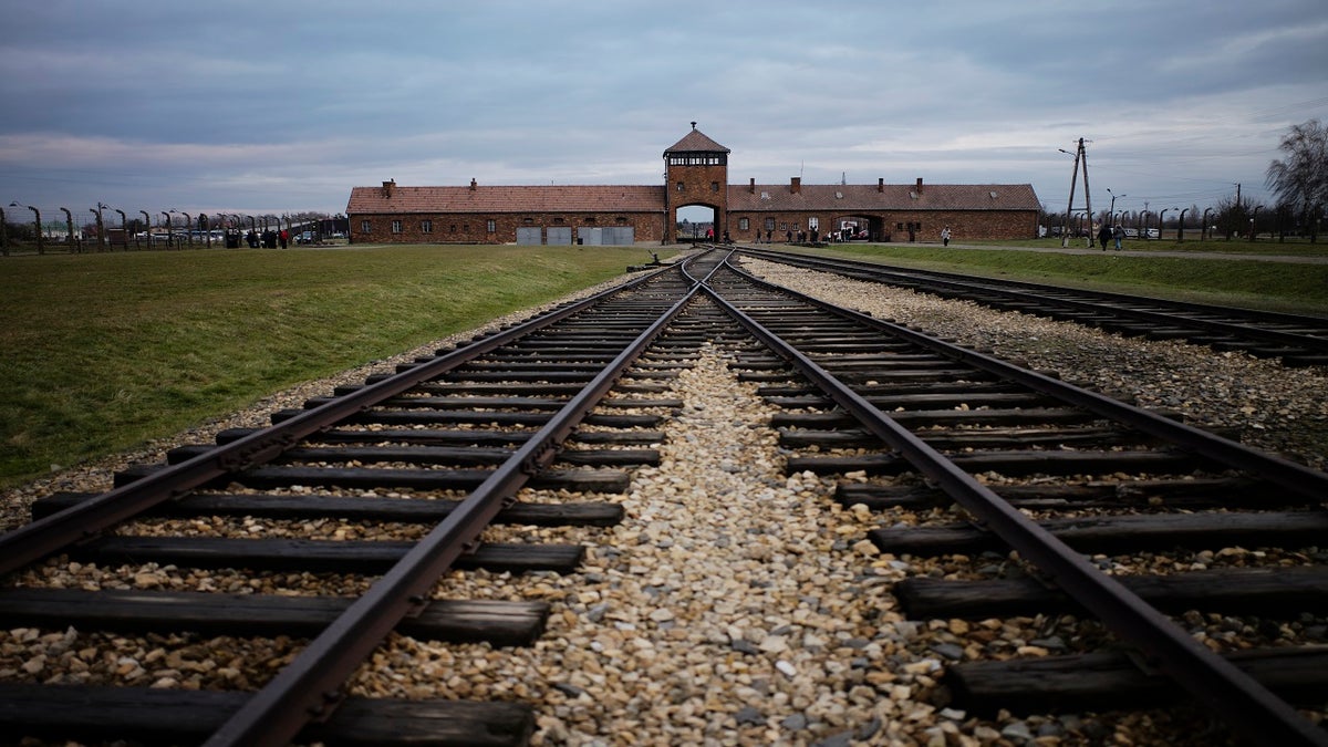 the railroad tracks leading to Auschwitz Nazi death camp