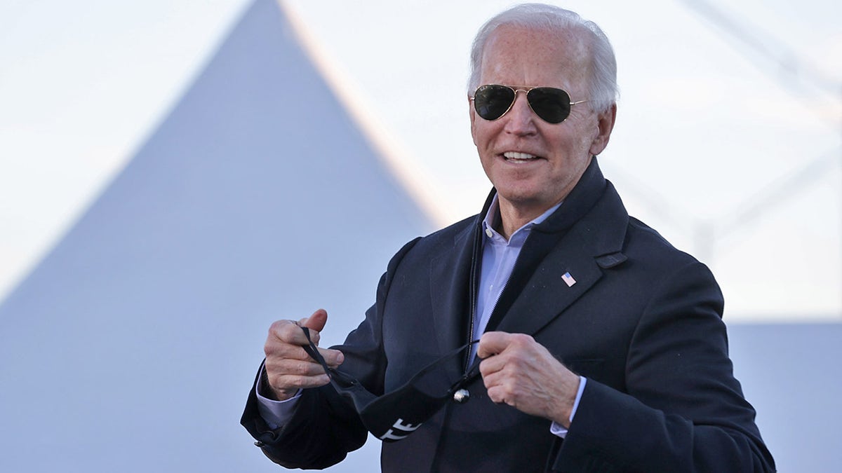 President-elect Joe Biden speaks during a campaign rally with Democratic candidates for the U.S. Senate Jon Ossoff and Rev. Raphael Warnock the day before their runoff election in the parking lot of Centerparc Stadium January 04, 2021 in Atlanta, Georgia. Biden will be sworn in as the United States' 46th president at noon on Tuesday. (Photo by Chip Somodevilla/Getty Images)