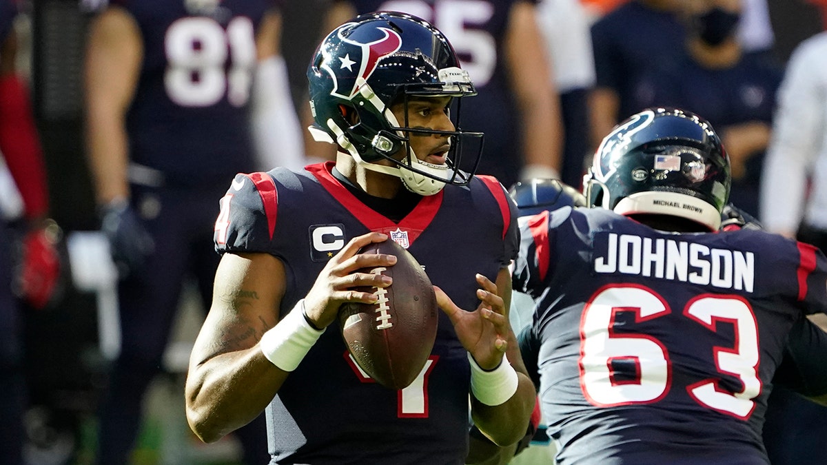Houston Texans quarterback Deshaun Watson (4) looks to throw a pass against the Tennessee Titans during the first half of an NFL football game Sunday, Jan. 3, 2021, in Houston. (AP Photo/Sam Craft)