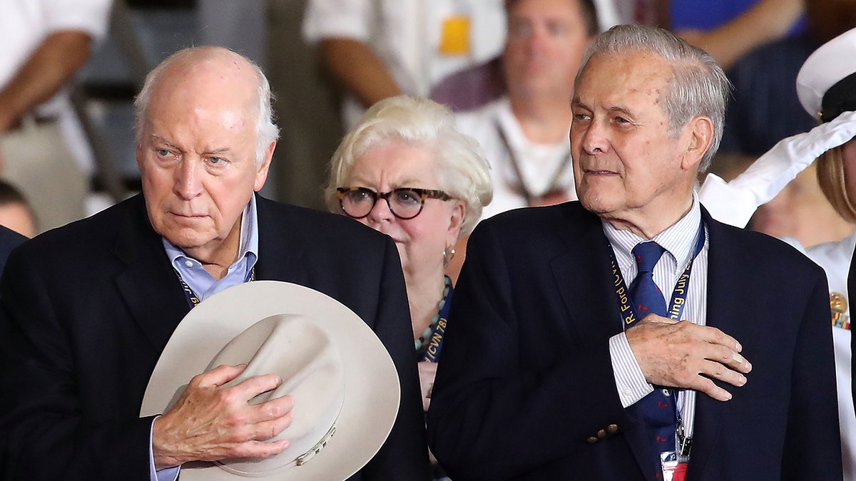 Former Vice President Dick Cheney (left) and former Secretary of Defense Donald Rumsfeld attend a commissioning ceremony on board the USS Gerald R. Ford CVN 78 on July 22, 2017, in Norfolk, Va. (Mark Wilson/Getty Images)