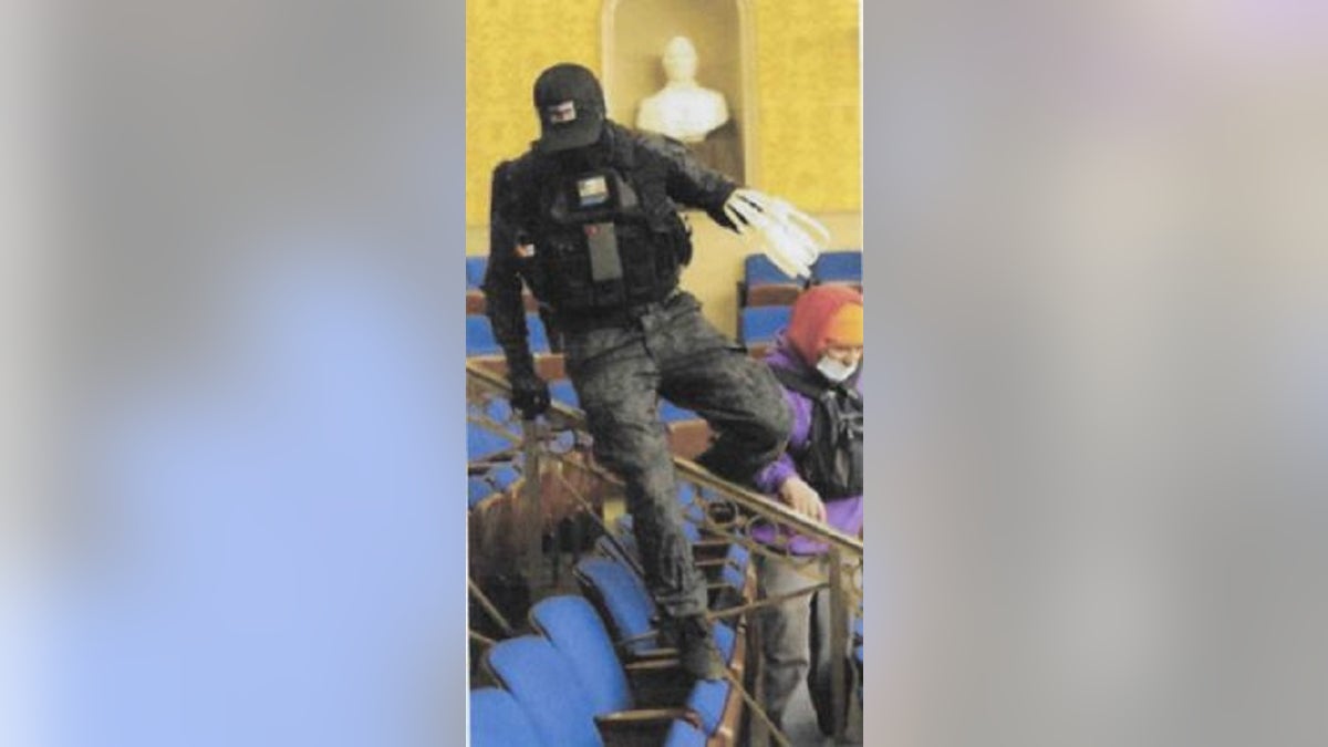 Eric Munchel, 30, is believed to be a man photographed carrying zip ties into the Senate Chamber during last week's riot at the Capitol building, the FBI said.