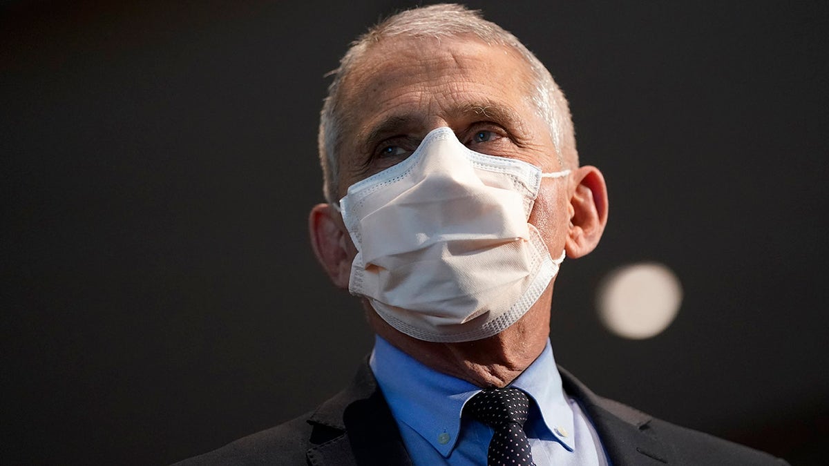 FILE - In this Dec. 22, 2020, file photo, Dr. Anthony Fauci, director of the National Institute of Allergy and Infectious Diseases, speaks before receiving his first dose of the COVID-19 vaccine at the National Institutes of Health, in Bethesda, Md. Fauci’s quick commitment to the WHO — whose response to the pandemic has been criticized by many, but perhaps most vociferously by the Trump administration — marks a dramatic and vocal shift toward a more cooperative approach to fighting the pandemic. (AP Photo/Patrick Semansky, Pool, File)