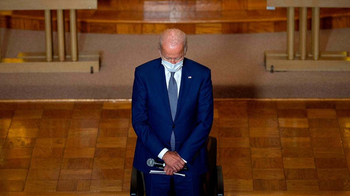 Then-Democratic presidential candidate Joe Biden prays at Grace Lutheran Church in Kenosha, Wisconsin, on Sept. 3, 2020, in the aftermath of the police shooting of Jacob Blake. 