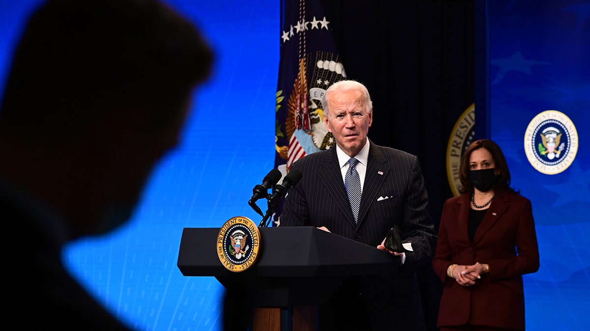 President Joe Biden with Vice President Kamala Harris answers questions from the media after signing a "Made in America" Executive Order in the South Court Auditorium at the White House on January 25, 2021, in Washington, D.C. (Photo by JIM WATSON/AFP via Getty Images)