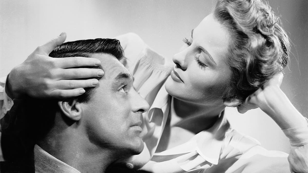 Joan Fontaine is married to the charming but untrustworthy Cary Grant in 'Suspicion' directed by Alfred Hitchcock.