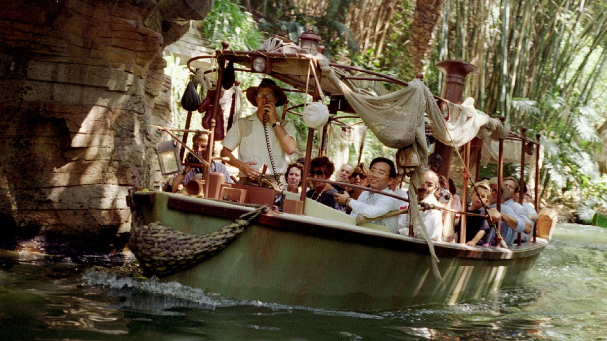 A photo of a tour group on the Jungle Cruise in Disneyland.