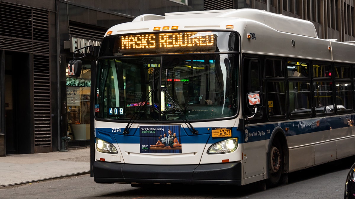 An MTA bus displays the message 'Masks Required' as New York City continues reopening efforts following restrictions imposed to slow the spread of coronavirus. (Photo by Noam Galai/Getty Images)