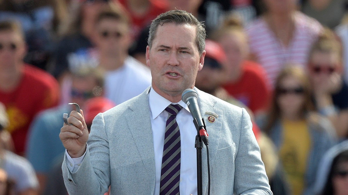 FILE - In this Friday, Oct. 16, 2020 file photo, Rep. Michael Waltz, R-Fla., speaks before President Donald Trump during a campaign rally at the Ocala International Airport in Ocala, Fla. (AP Photo/Phelan M. Ebenhack, File)