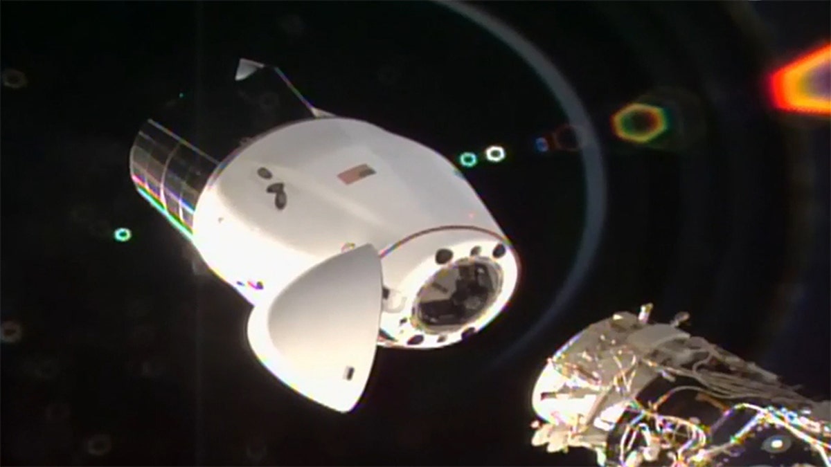 SpaceX's Cargo Dragon spacecraft begins its undocking from the International Space Station.