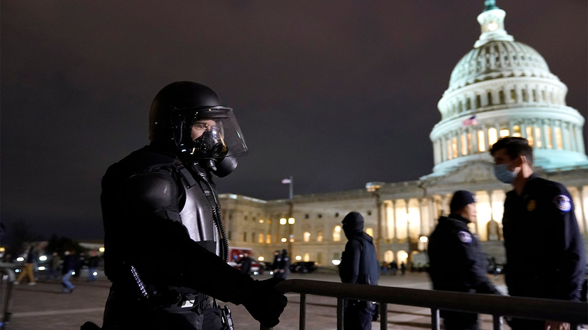 Authorities secure the area outside the U.S. Capitol, Wednesday, Jan. 6, 2021, in Washington. (AP Photo/Jacquelyn Martin)