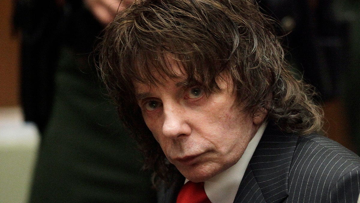 In this May 29, 2009 file photo, music producer Phil Spector sits in a courtroom for his sentencing in Los Angeles. Spector, the eccentric and revolutionary music producer who transformed rock music with his "Wall of Sound" method and who was later convicted of murder, died Saturday, Jan. 16, 2021, at age 81.