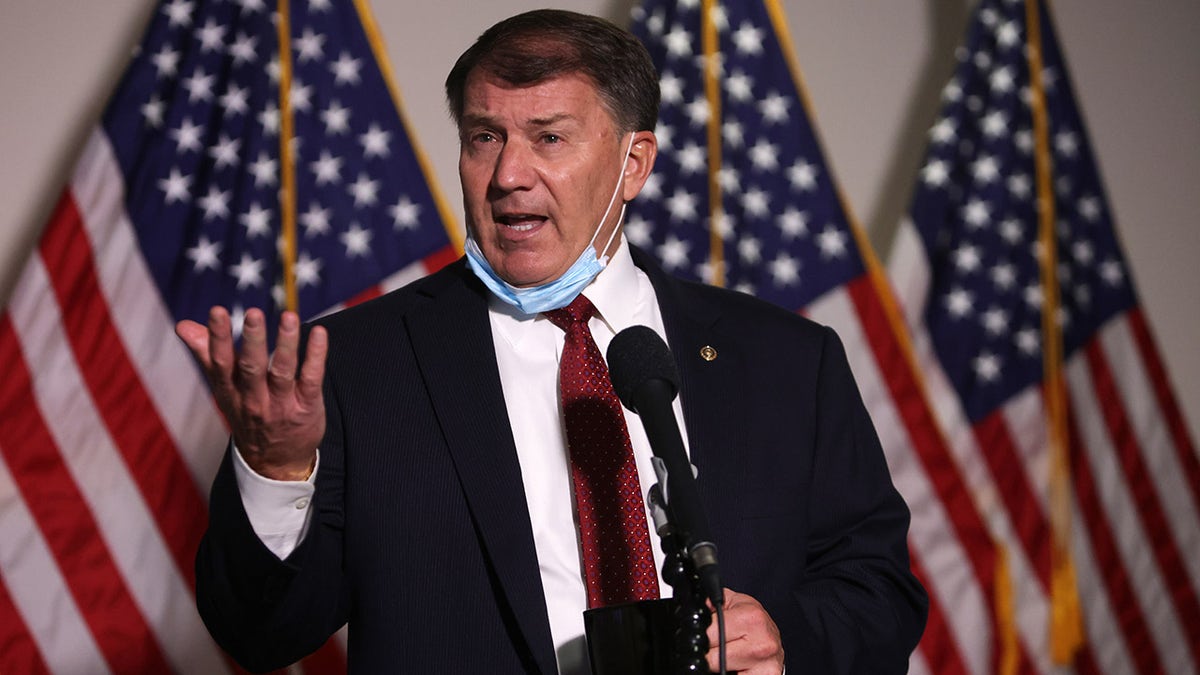 WASHINGTON, DC - NOVEMBER 18: U.S. Sen. Michael Rounds (R-SD) speaks to members of the press as he arrives at a Senate Republican policy luncheon at the Hart Senate Office Building November 18, 2020 on Capitol Hill in Washington, DC. Senate GOP members held a policy luncheon to discuss the Republican agenda. Rounds had to miss a vote on the Jan. 6 commission on May 28, 2021, due to work travel overseas, his spokesperson said. (Photo by Alex Wong/Getty Images)