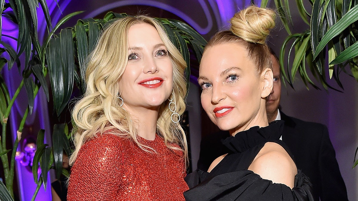 Kate Hudson (left) stars as Zu in the upcoming movie musical 'Music' directed and co-written by Sia (right). (Photo by Stefanie Keenan/Getty Images for Daily Front Row)