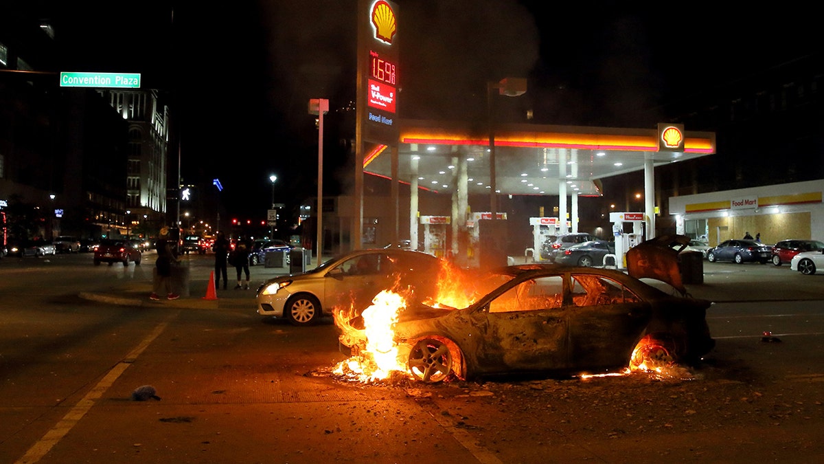 Car burns during 2020 riots