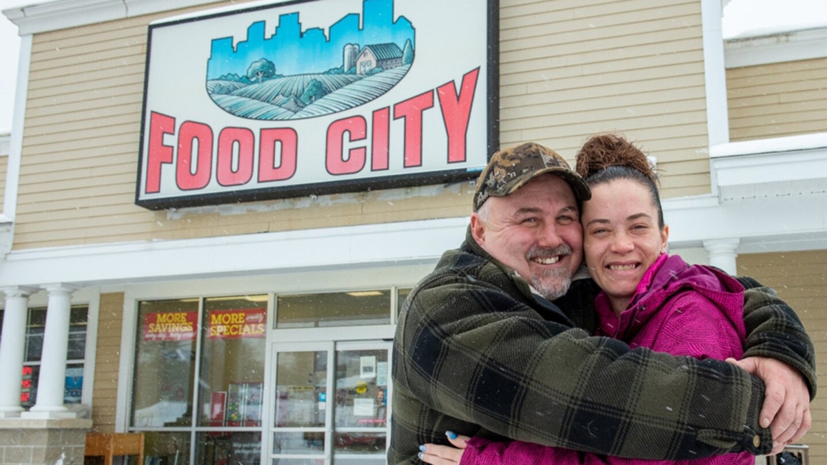 Glenn Theriault and Stephanie Lemieux at the lucky Food City store in Turner, Maine.