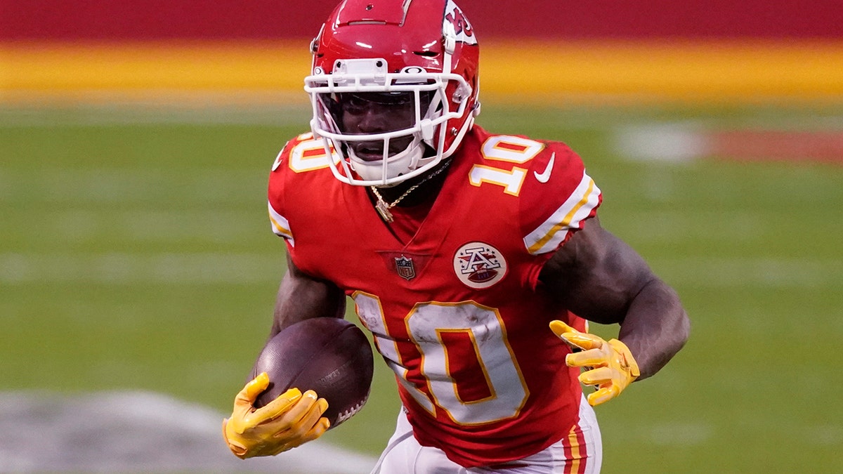 Kansas City Chiefs' Tyreek Hill walks off the field at the end of the game  after the Chiefs defeated the Chargers 38-28 at StubHub Center in Carson,  California on September 9, 2018.