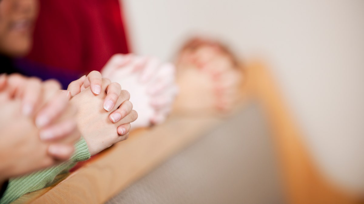 praying in the pews