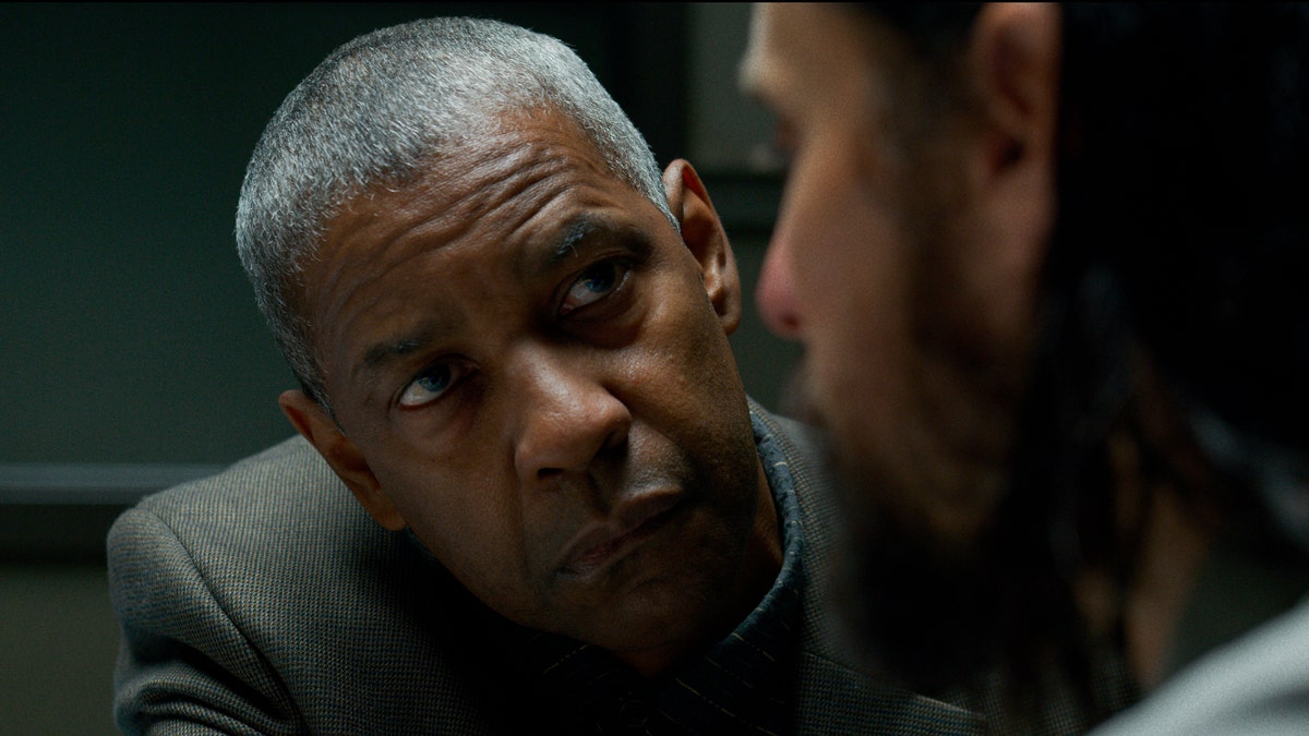This image released by Warner Bros. Pictures shows Denzel Washington and Jared Leto in a scene from "The Little Things."