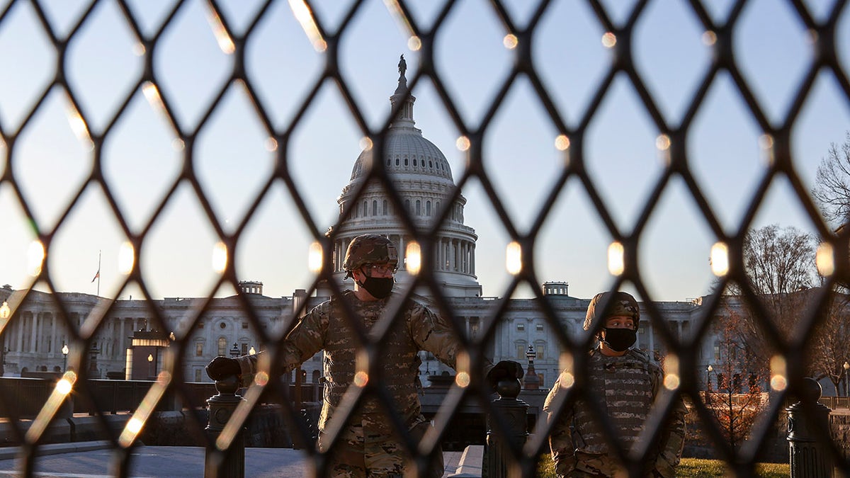 U.S. National Guard troops stand guard at the U.S. Capitol on Jan. 12,  in Washington, DC. The Pentagon is deploying as many as 15,000 National Guard troops to protect President-elect Joe Biden's inauguration on January 20, amid fears of new violence. (Photo by Tasos Katopodis/Getty Images)