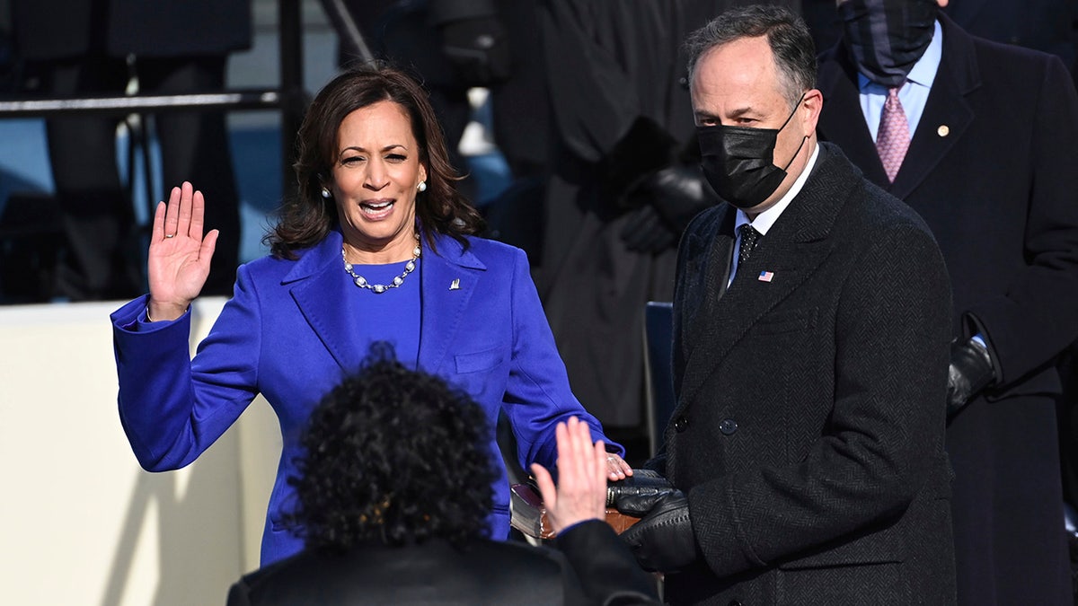 Kamala Harris was sworn in as vice president by Supreme Court Justice Sonia Sotomayor while her husband Doug Emhoff held the Bible. The 59th Presidential Inauguration took place at the U.S. Capitol on Jan. 20, 2021. (Saul Loeb/Pool Photo via AP)