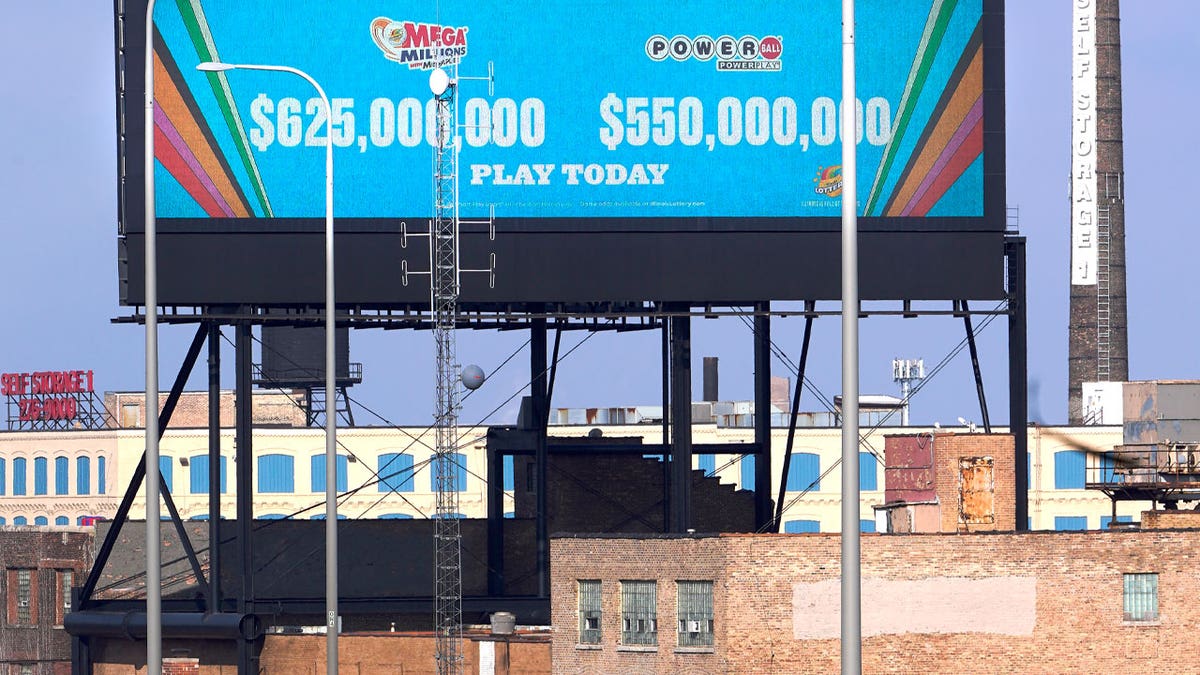 Lottery players had a shot Tuesday night at the eighth-largest jackpot in U.S. history, thanks to months without a winner of the big prize. (AP Photo/Charles Rex Arbogast)