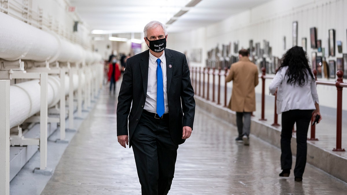 Rep. Tom McClintock (R-CA) wears a protective mask while walking through the Cannon Tunnel to the U.S. Capitol on January 12, 2021, in Washington, DC. (Photo by Stefani Reynolds/Getty Images)