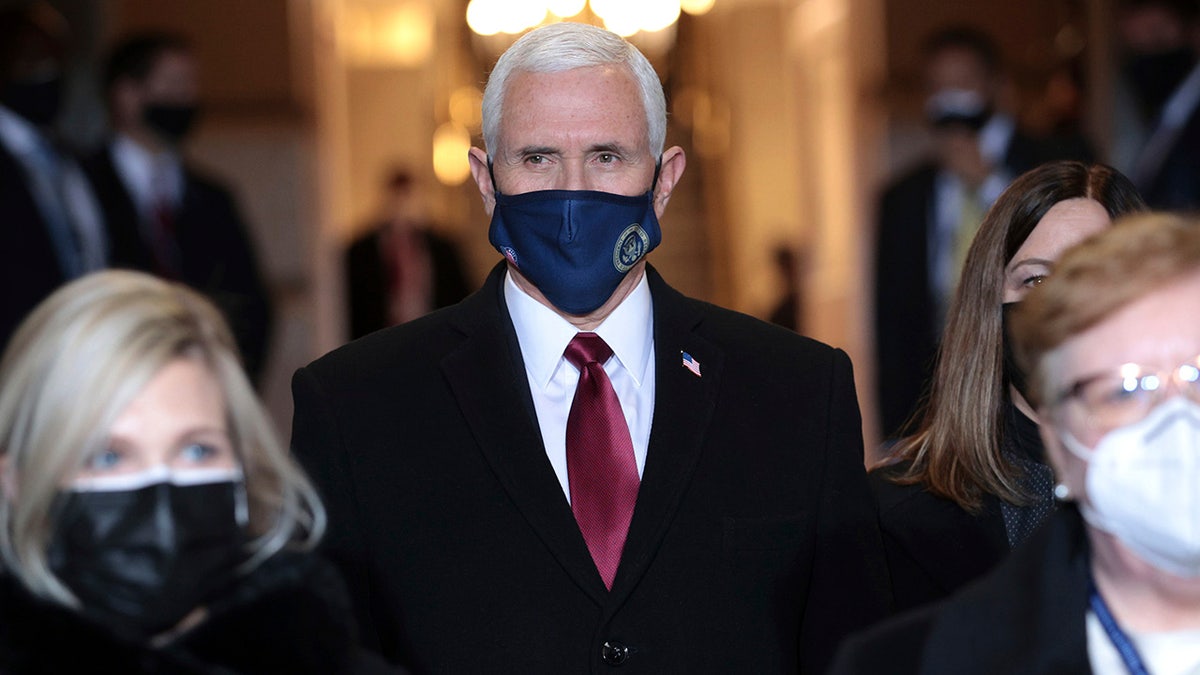 Vice President Mike Pence arrives at the inauguration of President-elect Joe Biden on the West Front of the U.S. Capitol on Wednesday, Jan. 20, 2021 in Washington.