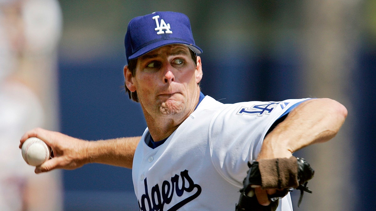 Los Angeles Dodgers pitcher Scott Erickson throws to a Los Angeles Angels batter in a baseball game in Los Angeles, April 3, 2005. (Associated Press)