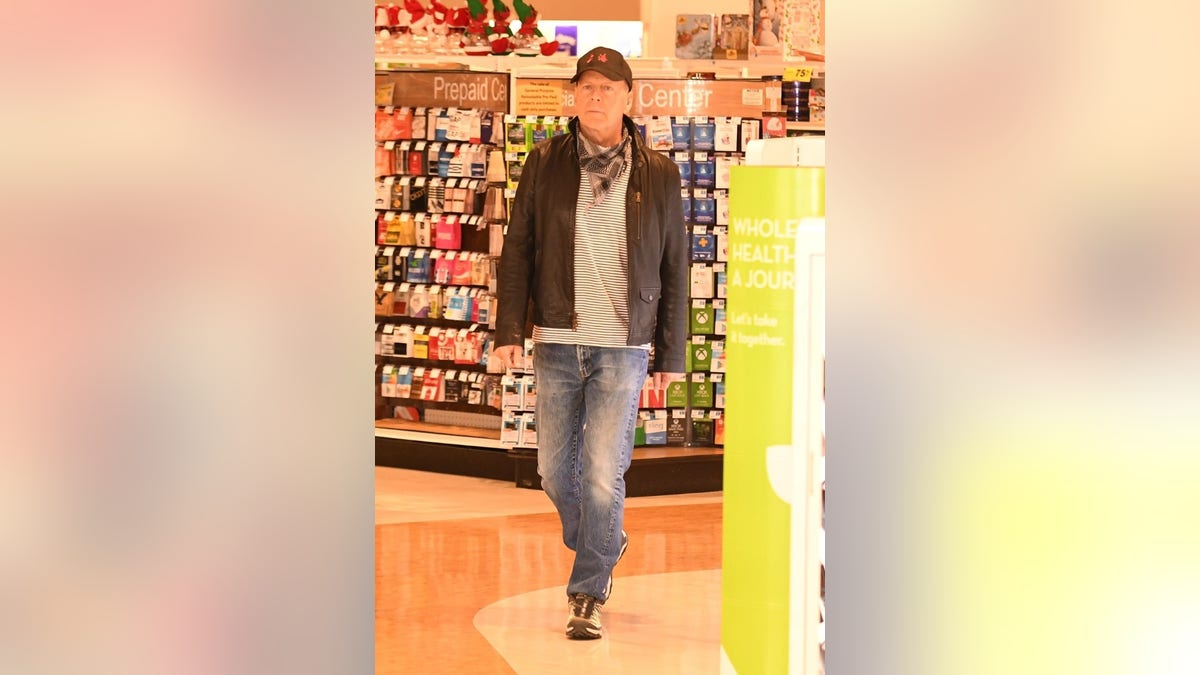 Bruce Willis was photographed at a Rite Aid in Los Angeles after refusing to put on a mask.
