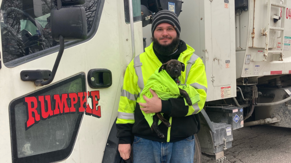 Aaron Kinsel was working Wednesday morning when he noticed a bag moving on the side of the road and went to investigate. A 10-week-old boxer-mix puppy was inside. (Rumpke)