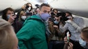 Supporters await Navalny’s return at Moscow airport, where he faces the threat of arrest