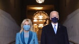 WASHINGTON, DC - JANUARY 20: U.S. President-elect Joe Biden and Jill Biden arrive at his Biden's inauguration on the West Front of the U.S. Capitol on January 20, 2021 in Washington, DC. During today's inauguration ceremony Joe Biden becomes the 46th president of the United States. (Photo by Win McNamee/Getty Images)