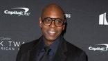 FILE - In this Oct. 27, 2019, file photo, Dave Chappelle arrives at Kennedy Center for the Performing Arts for the 22nd Annual Mark Twain Prize for American Humor presented to Dave Chappelle, in Washington. Chappelle tested positive for the coronavirus just before his comedy show scheduled for Thursday, Jan. 21, forcing his upcoming appearances to be canceled, a spokeswoman said. ()