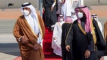 Saudi Arabia's Crown Prince Mohammed bin Salman, welcomes Qatar's Emir Sheikh Tamim bin Hamad al-Thani