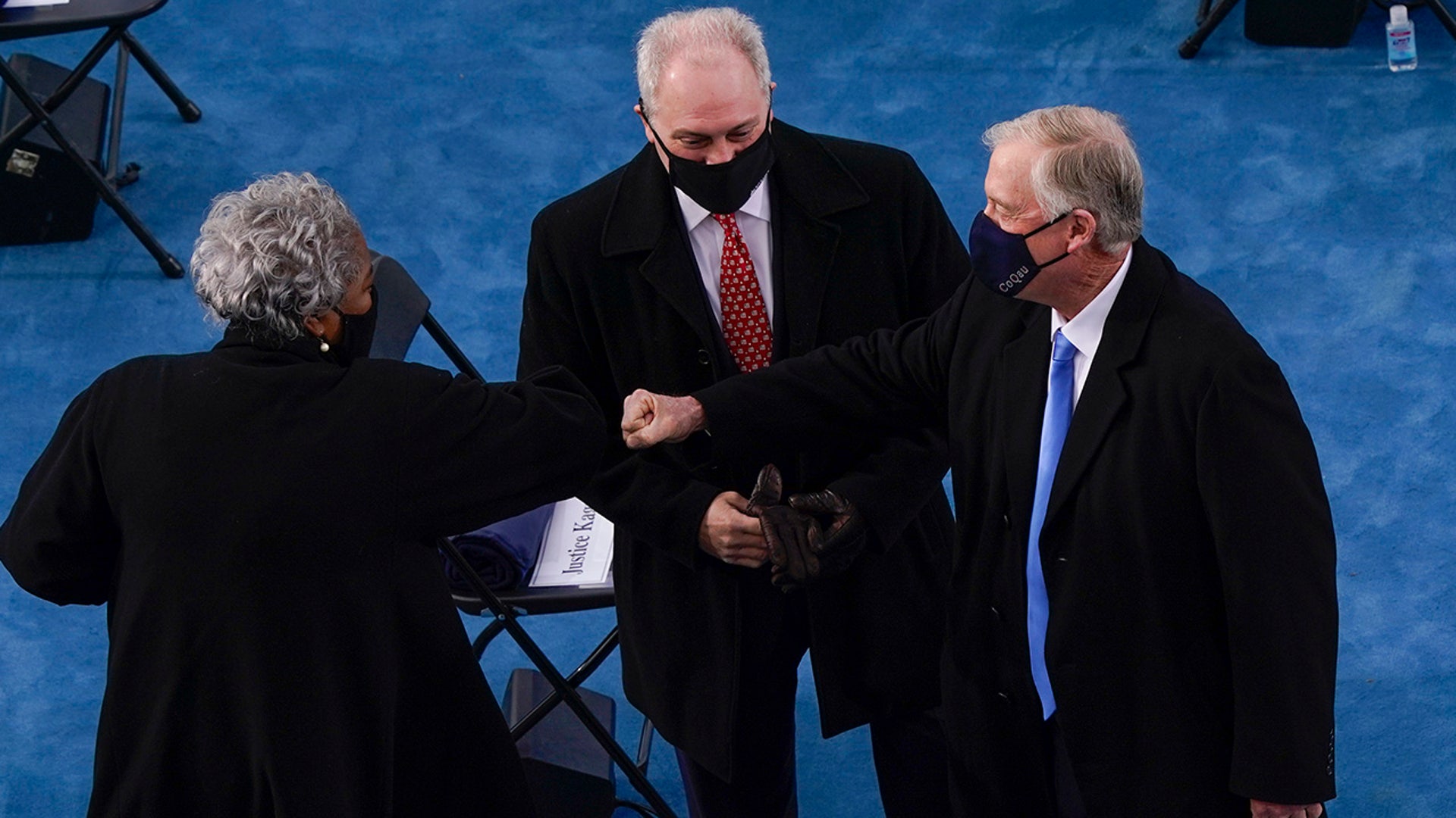 Former Democratic National Committee Chairwoman Donna Brazile, left, greeting former Vice President Dan Quayle, right, as House Minority Whip Steve Scalise, R-La., center, looks on as they arrive at the 59th Presidential Inauguration at the U.S. Capitol in Washington, Wednesday, Jan. 20, 2021. Brazile was invited to the inauguration as Scalise's guest