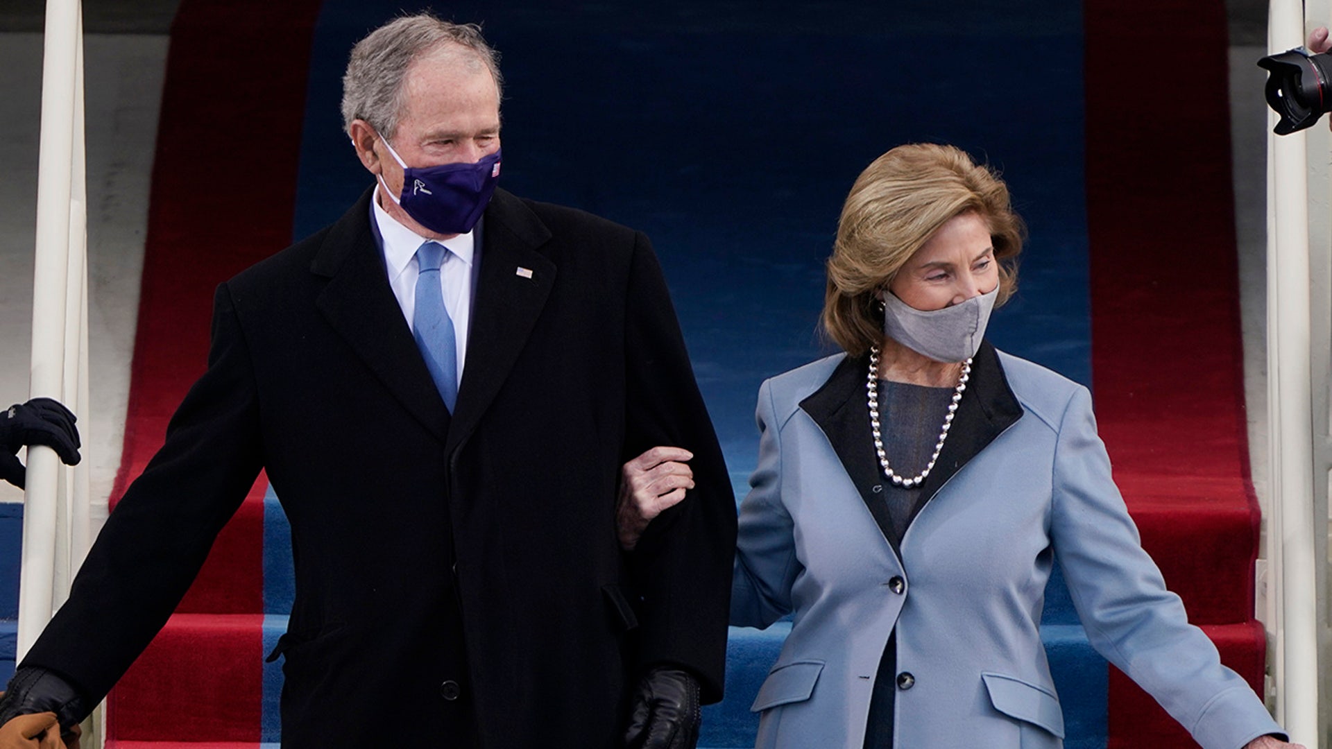 Former President George W. Bush and his wife Laura arrive for the 59th Presidential Inauguration at the U.S. Capitol for President-elect Joe Biden in Washington, Wednesday, Jan. 20, 2021.