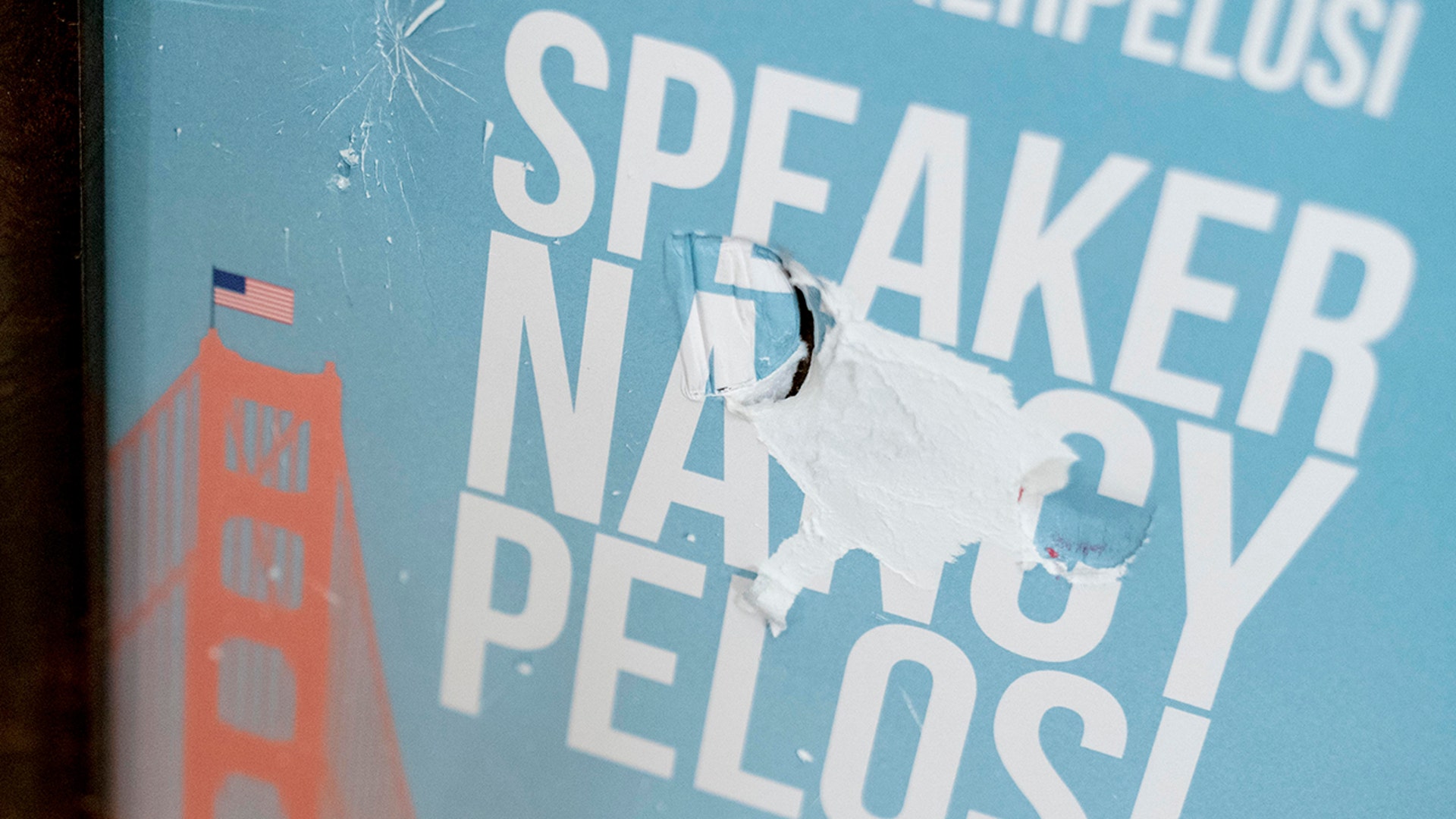 The sign in front of the office of Speaker of the House Nancy Pelosi, D-Calif., is damaged as seen in the early morning hours at the Capitol in Washington, Thursday, Jan. 7, 2021, after protesters stormed the Capitol.