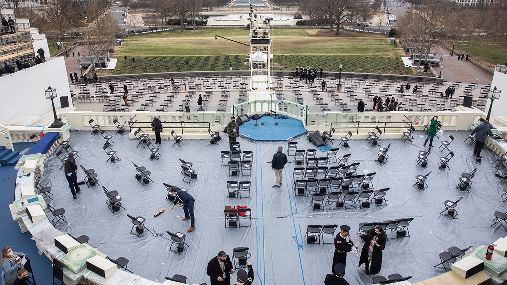 Preparations are made prior to a dress rehearsal for the 59th inaugural ceremony for President-elect Joe Biden and Vice President-elect Kamala Harris at the Capitol, Monday, Jan. 18, 2021, in Washington.