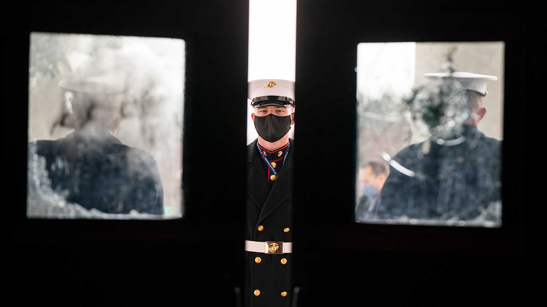 U.S. Marine Corps. stand by a door of the U.S. Capitol during a dress rehearsal for the 59th inaugural ceremony for President-elect Joe Biden and Vice President-elect Kamala Harris at the Capitol, Monday, Jan. 18, 2021, in Washington.
