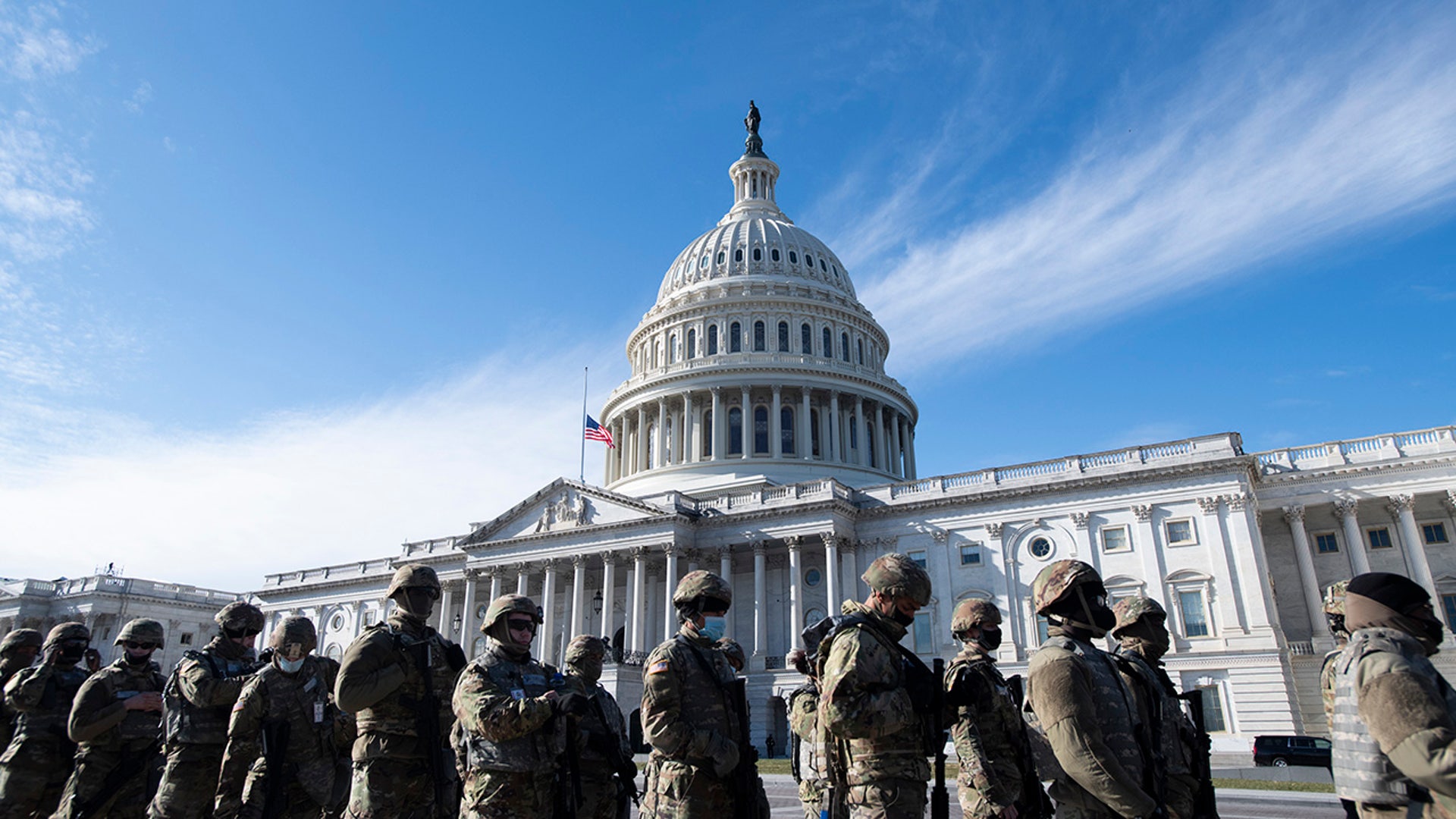 National Guardsmen stand outside the U.S. Capitol before a dress rehearsal for the 59th inaugural ceremony for President-elect Joe Biden and Vice President-elect Kamala Harris at the Capitol, Monday, Jan. 18, 2021, in Washington.