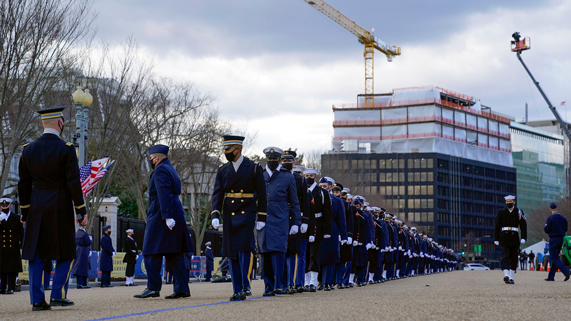 Members of the military march in formation on Pennsylvania Avenue in front of the White House in Washington, as they rehearse ahead of President-elect Joe Biden's inauguration ceremony, Monday, Jan. 18, 2021.