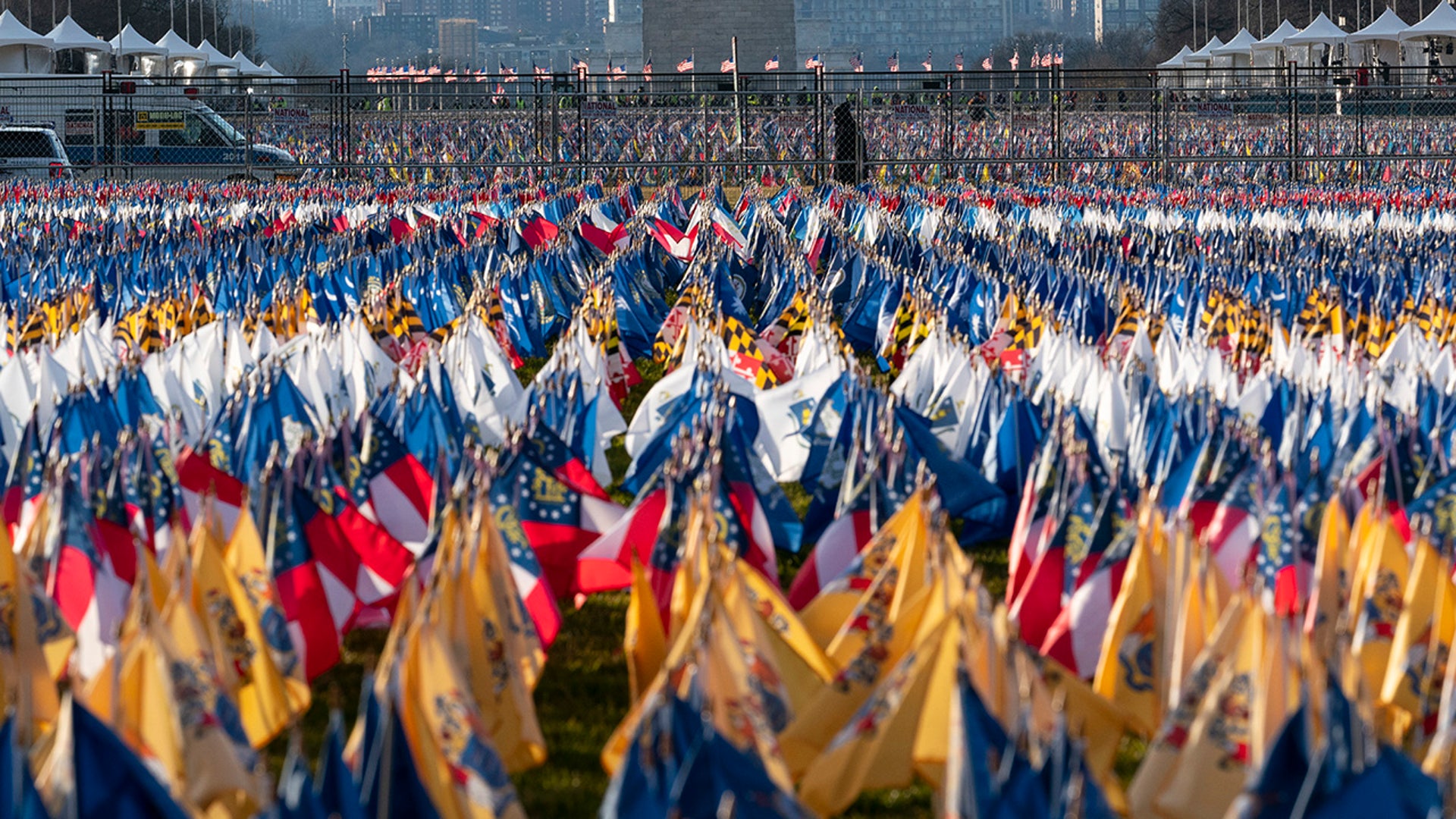 Flags are placed on the National Mall ahead of the inauguration of President-elect Joe Biden and Vice President-elect Kamala Harris, Monday, Jan. 18, 2021, in Washington.