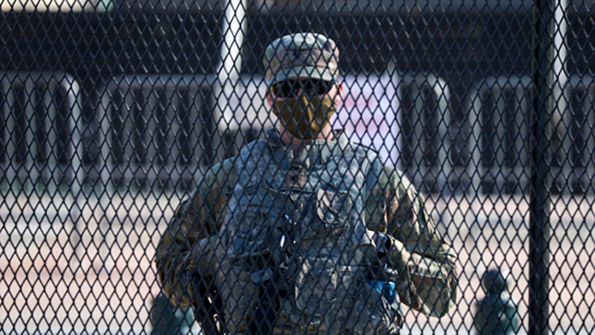 WASHINGTON, DC, USA - JANUARY 13: Members of the National Guard are issued weapons outside of the U.S. Capitol in Washington, D.C., U.S., on Wednesday, Jan. 13, 2021. (Photo by Yasin Ozturk/Anadolu Agency via Getty Images)