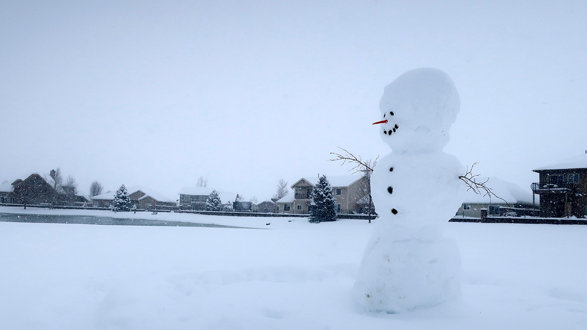 A snowman stands in a field in Bellemont, Ariz., on Monday, Jan. 25, 2021. A series of winter storms have dropped more precipitation in Flagstaff than the city had during last summer's monsoon season. The recent snow measured as water topped the amount of rain that fell from mid-June through September, the driest monsoon season on record.