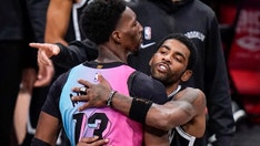 Kyrie Irving, Bam Adebayo postgame hug broken up amid NBA's tightened safety rules