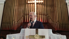 Catholic bishops approve Communion document aimed at possible rebuke of Biden