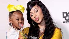 Cardi B reveals baby bump during BET Awards performance