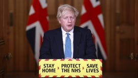 China targets PM Boris Johnson after suggestion coronavirus could have spread from grinding pangolin