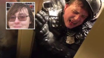 Capitol riot suspect seen pinning officer during attack arrested